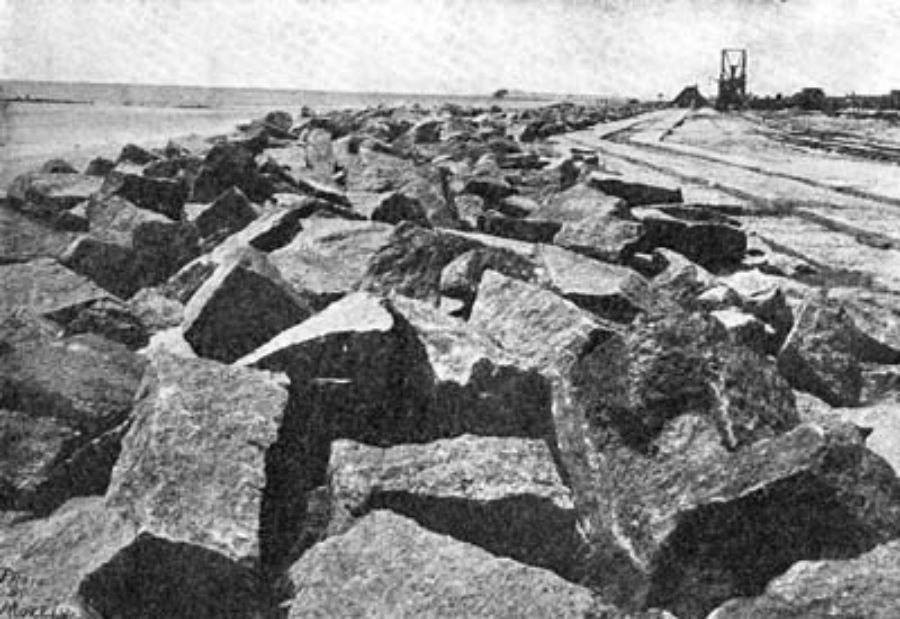 G-5925.1FF3-6 THE GALVESTON SEAWALL.  SCENE SHOWING RIPRAP AND FOUNDATION OF SEAWALL.