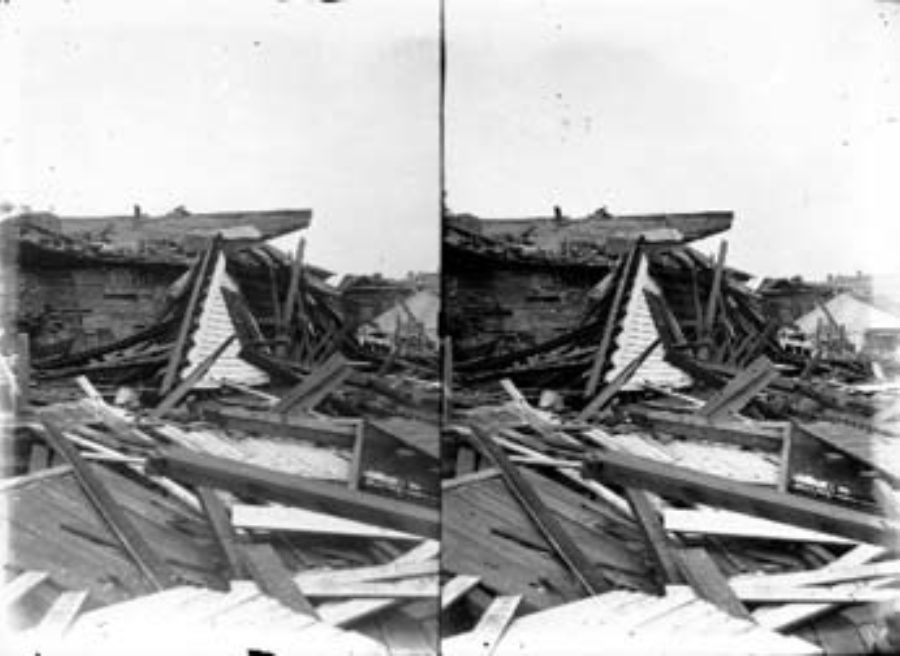SC#194-12 Debris piled up from wrecked houses