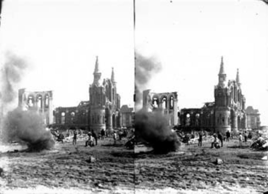 SC#194-23 Burning bodies near Sacred Heart Church.